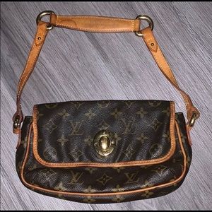 Very damaged, very real Louis Vuitton! Price Firm!
